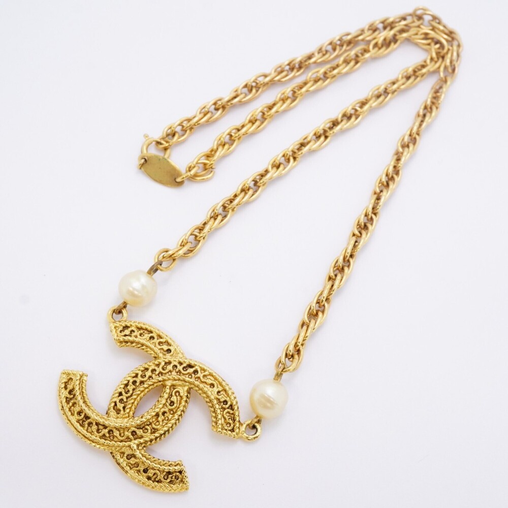 CHANEL Gold Pearl Logo Necklace - Picture 3 of 8
